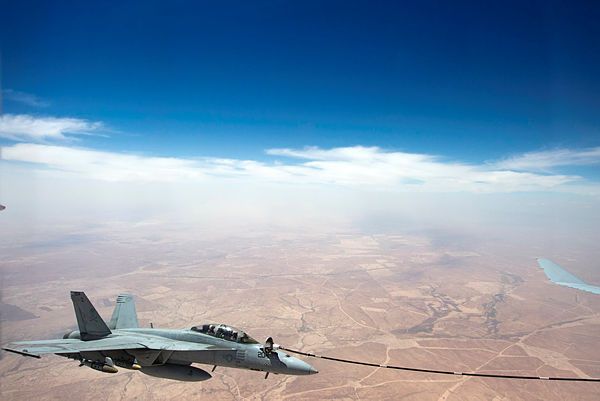 A United States Navy F/A-18F Super Hornet, assigned to VFA-103 'Jolly Rogers', refuels from a Royal Australian Air Force KC-30A Multi Role Tanker Transport in the skies over the Middle East region. (Aus MoD)