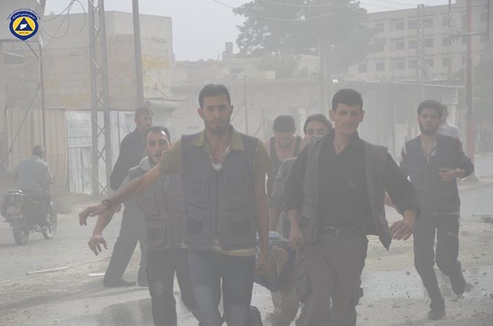Rescuers help the injured after a reported Russian strike on Missraya, Oct 23 (via White Helmets)