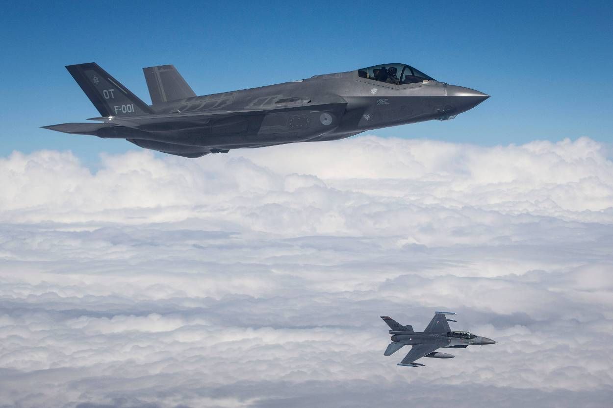 A Dutch F-35 Lightning II in the foreground with a F-16 in the background (via Dutch MoD)