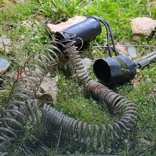 1 of 3: "Remnants of the airdrop of the American occupation in the town of Atma on the Syrian-Turkish border." (Image via @jamlyyyyy_ / Twitter)