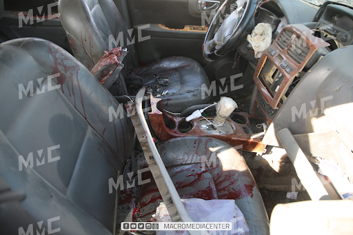 Blood of the victims on the car struck with a drone attack on the Ariha Al-Mastouma road on December 3, 2021. (Image posted by Macro Media Center)