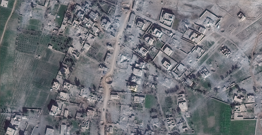Imagery shows three craters on the main road. Northeast from the second crater, which is located towards the center of the image, a building, which is assumed to be Yarmouk Hospital, is completely destroyed. (via Bellingcat)