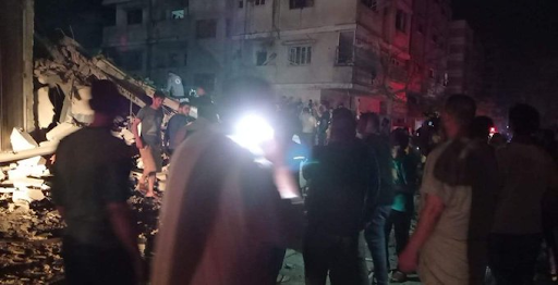 Rescue crews search through the rubble for survivors following strikes on Al Shati camp on May 15th, 2021. (Image posted by @PalinfoAr)