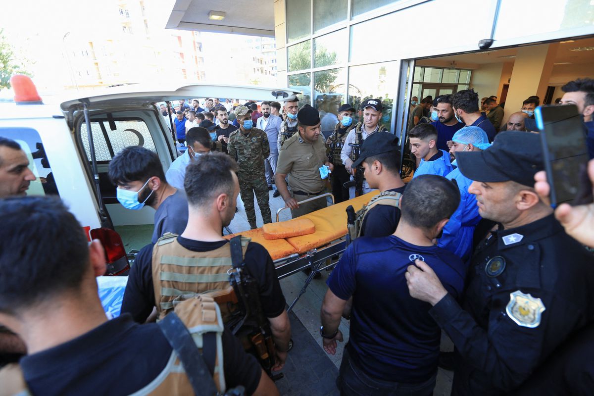 Security forces gather outside a hospital after a Turkish attack, in Zakho, Iraq, July 20, 2022. REUTERS/Ari Jalal