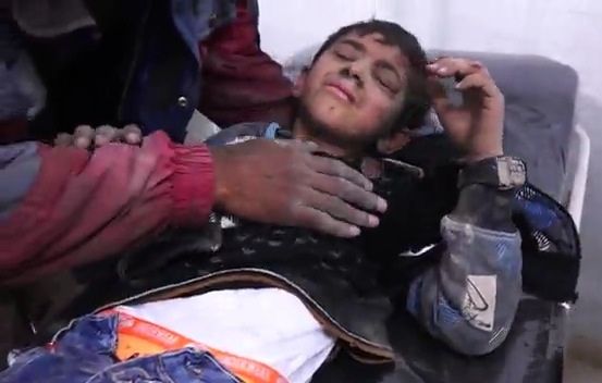 A child receives medical treatment after a strike on Raqqa, April 14th (via RBSS)