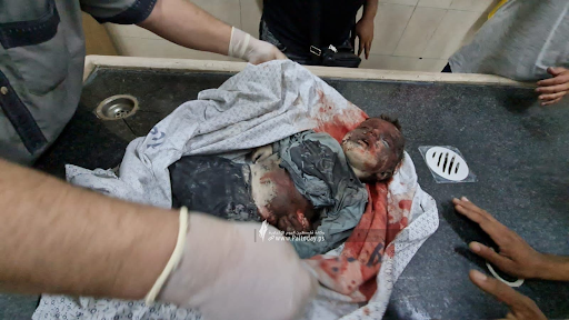 Very graphic image of a child allegedly killed in strikes on Al Jeniya neighborhood on May 13, 2021. (Image posted by Paltoday News)