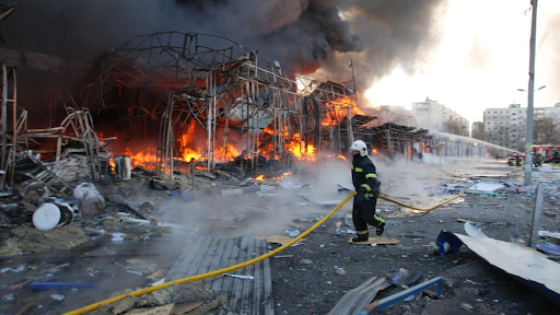 a fire at the market in the Heroiv Pratsi on March 16, 2022. (Image posted by Suspilne News)