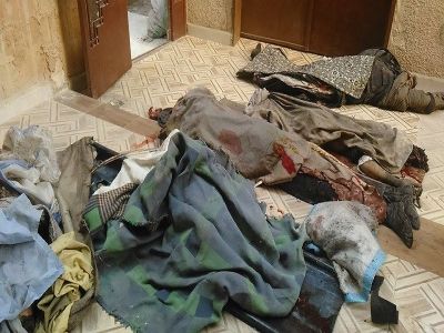 Dead bodies covered following an alleged Russian airstrike on Kafr Batna, Dec 4th. (via SNN)