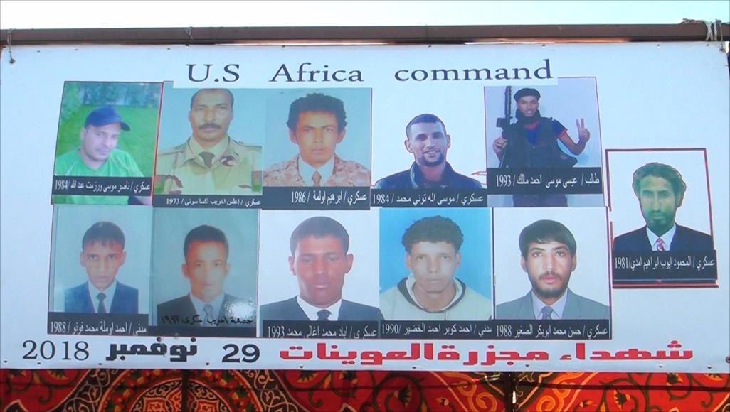 Banner from the demonstration showing the names and ages of the victims (via Al Jazeera)