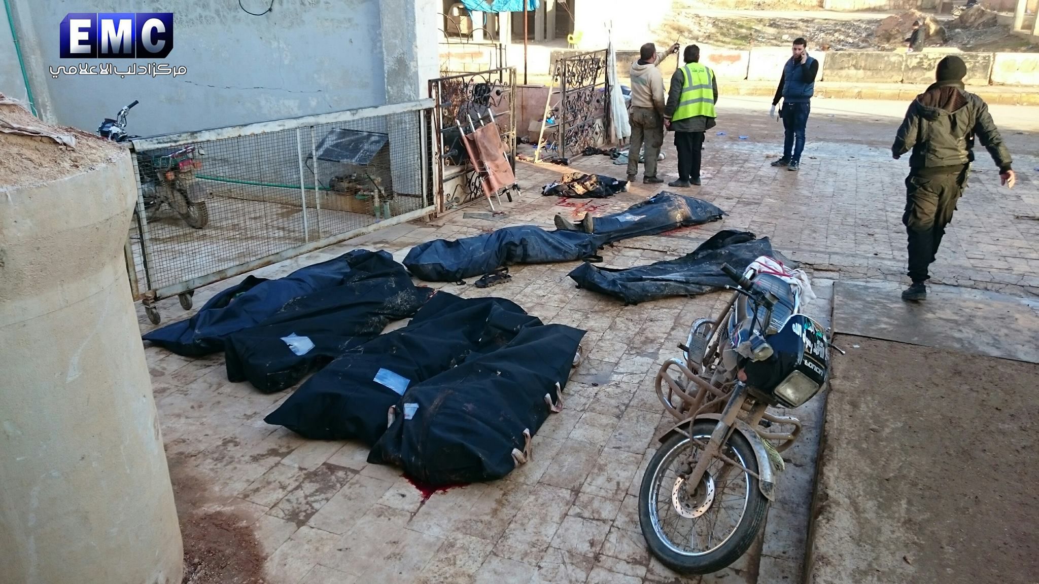 Victims of a suspected US targeted strike on fatah al Sham which also killed a civilian policeman (picture via Idlib Media Centre)