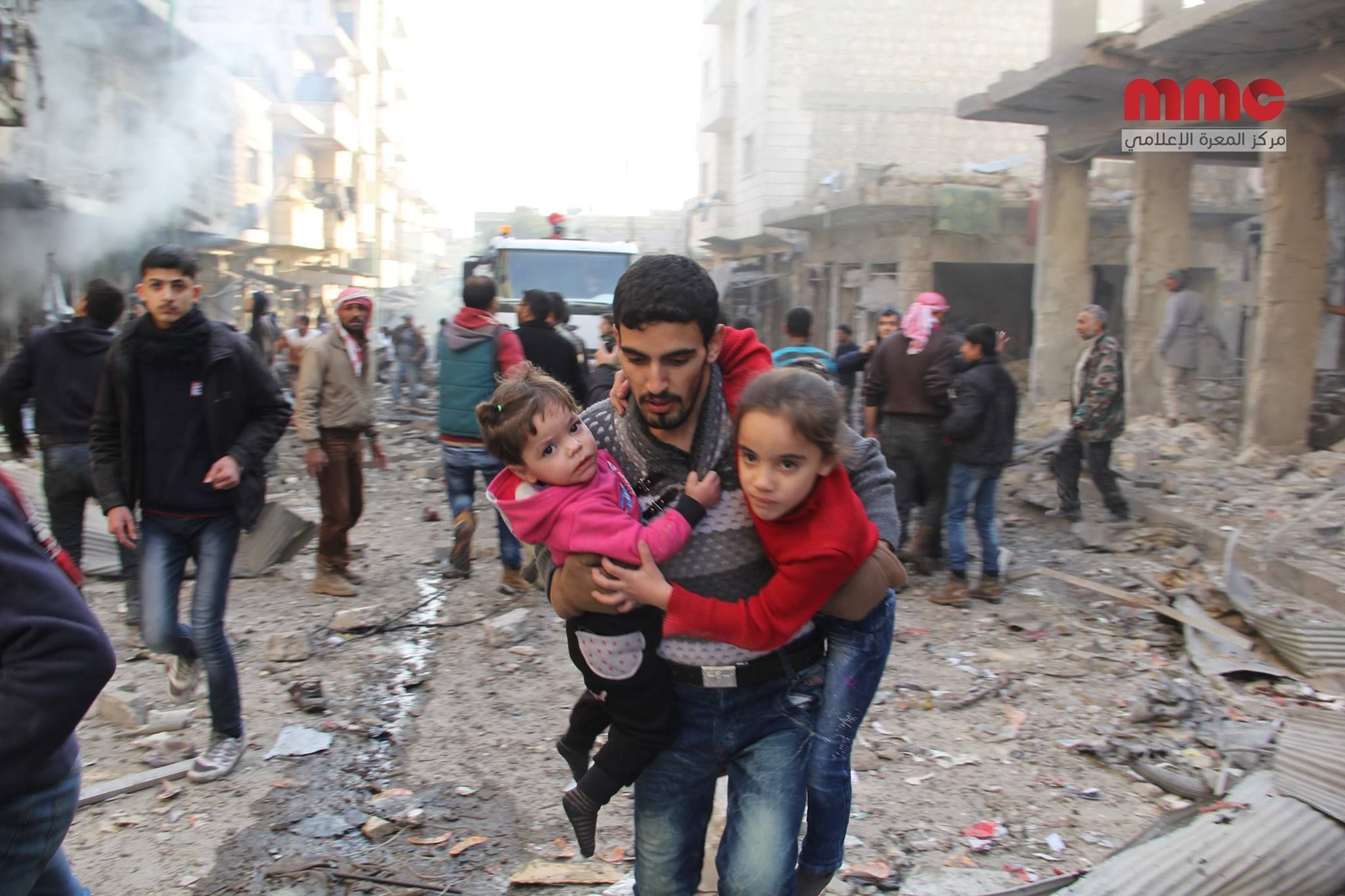 Civilians attempt to flee following a strike on a market in the town of Maarat al Numan in southern Idlib, December 4th 2016. Sources blamed both Russia and the regime. (via Shaam News Network)