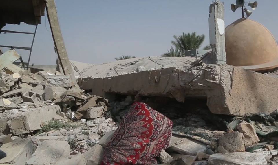 The destroyed mosque at al Bubadran in which up to 60 civilians were reported killed in an alleged Coalition strike on October 18th (image with al Free Deir Ezzor Radio – most likely grabs from an ISIS propaganda video)