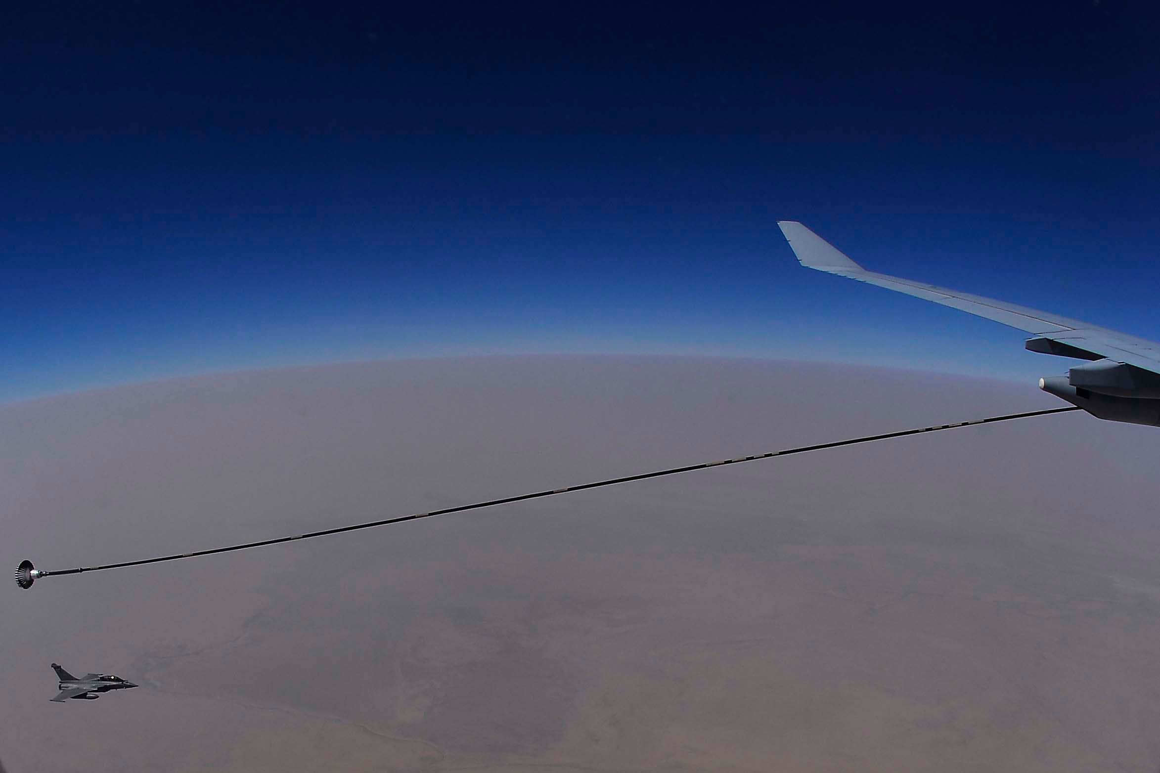 A French Air Force Rafale approaches a Royal Australian Air Force KC-30A to refuel during a combat sortie over Iraq July 2, 2015. (USAF/ Tech. Sgt Christopher Boitz)