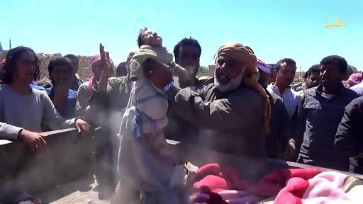 A series of stills from a video published by ISIS-affiliated media showing very graphic imagery of the dead a large proportion of them children. The video itself has been removed from youtube. [Via: SN4HR report published on May 6th 2015]