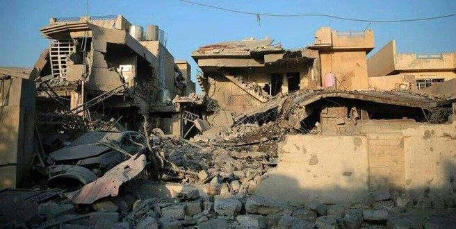 The aftermath of raids near Muthanna school with dozens of civilians under the rubble (via Iraqi Spring Media Center)