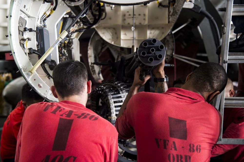 A 20mm gun is removed from an F/A-18E Super Hornet, Nov 7th (US Navy)