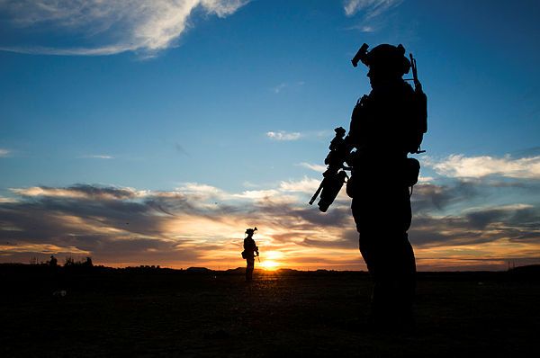 Australian Army soldiers from Task Group Taji 2's Force Protection Company await Iraqi Army soldiers to arrive to begin the evening's training at Taji Military Complex, Iraq (Australian Dept of Defence)