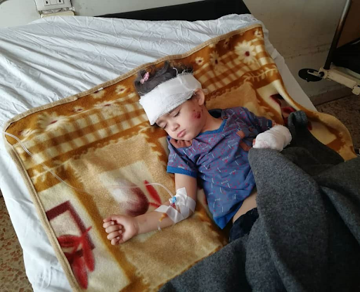 A child injured in alleged Israeli airstrikes on locations in Hama on January 22nd, 2021. (via @SyriawatanNews).