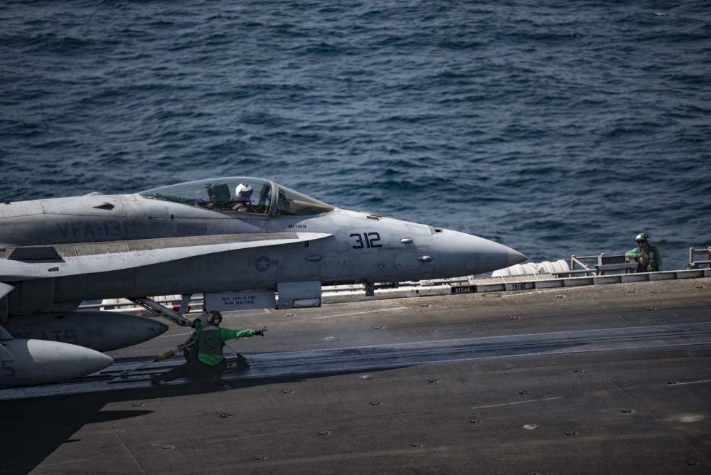 An F/A-18C Hornet prepares to launch off of the flight deck of the aircraft carrier USS Dwight D. Eisenhower, Oct 5th (US Navy)