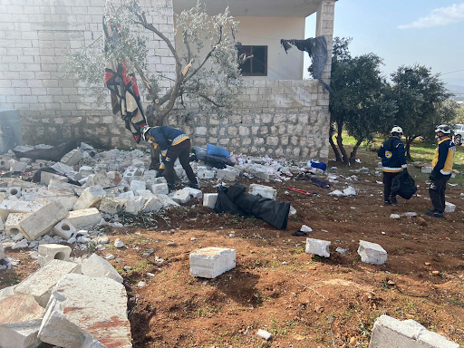 2 of 2: Syrian Civil Defense respond to the scene in the morning of February 3rd 2022 after a US air raid (Image via Syria TV)