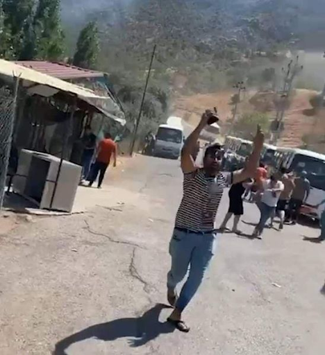 Tourists run away from the site of alleged Turkish artillery shelling that hit a touristic site in Kurdistan Region’s Duhok province on July 17, 2022. (Image posted by Erbil my city via Facebook)