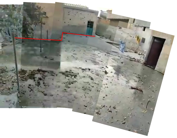 Panoramic stitch of building struck with outline of courtyard.