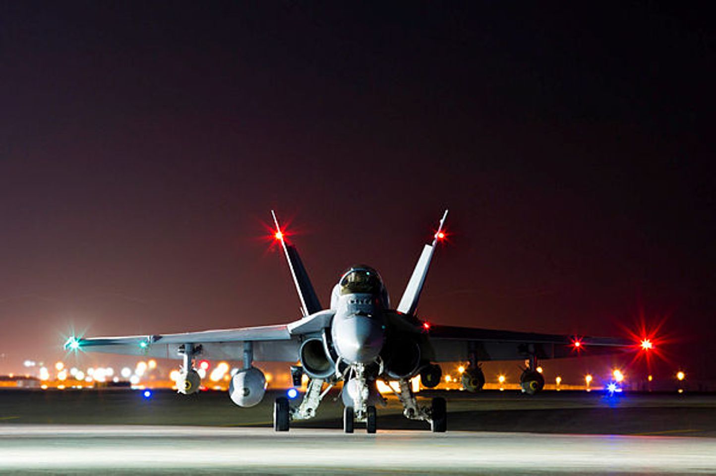 A Royal Australian Air Force F/A-18A Hornet prepares to depart on a mission to strike a Deash headquarters compound in Mosul, Iraq, from Australia’s main air operating base in the Middle East region. (Aus MoD)