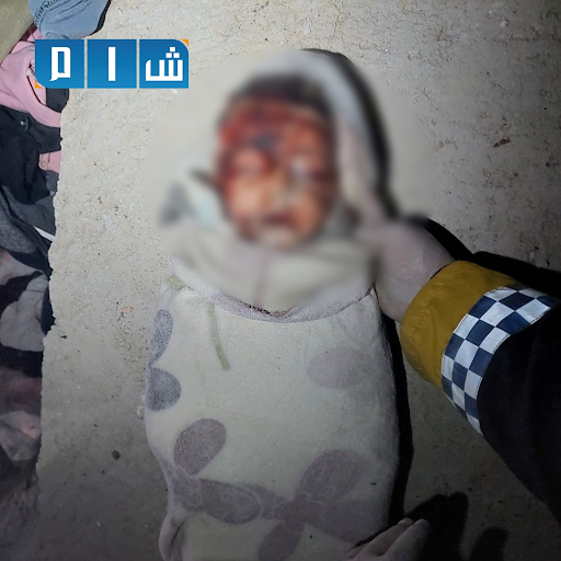 1 of 4: Pictures showed the remains of child victims after a US air drop which has reportedly killed at least eleven civilians, including at least six children (Image via Shaam)