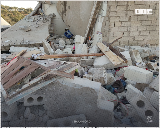 Shaam news uploaded photographs of the destruction and remains of the house which was targeted by a US air drop operation on February 3rd in the Atma region of northern Syria (Image via Facebook)