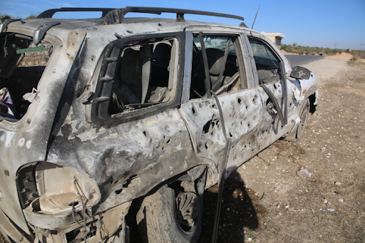 ""The shrapnel hit the left side of the car, tearing through that side," Ahmed Qasoum said", Image via Middle East Eye/Izzeddin Kasim.