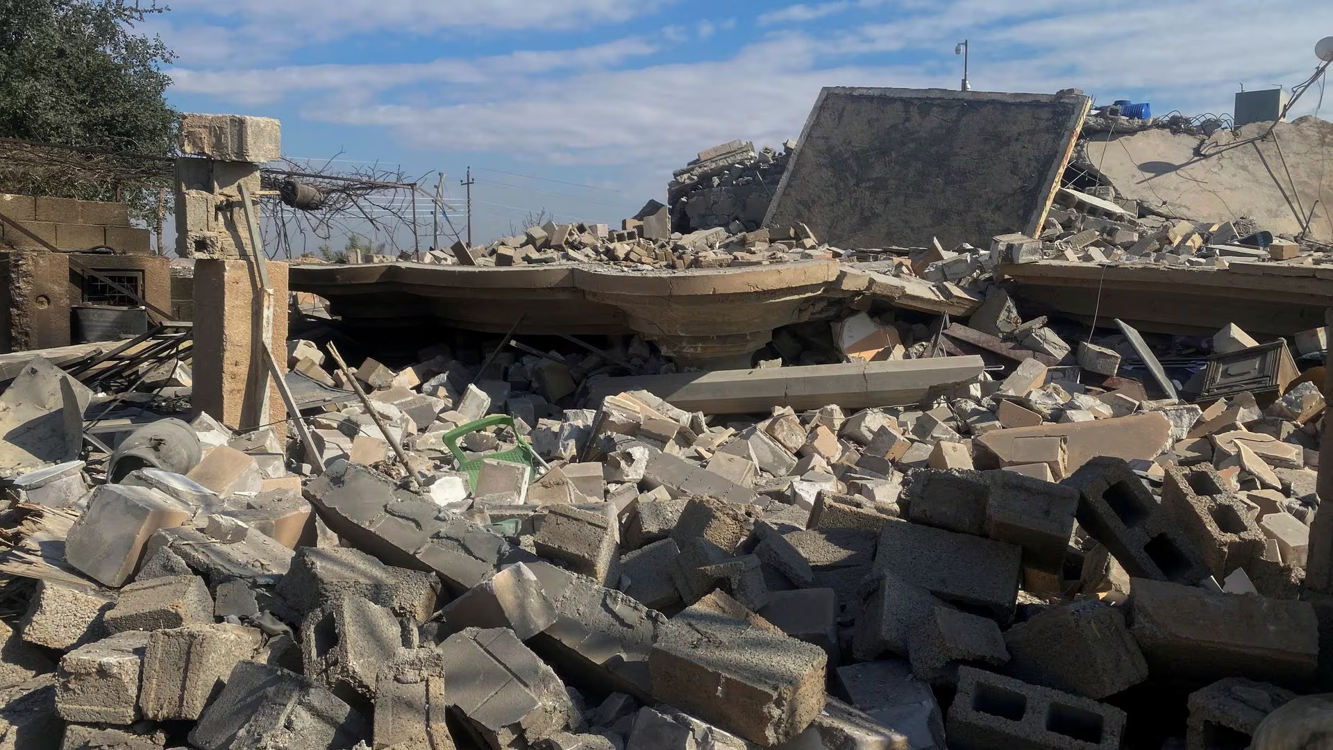 A destroyed building is pictured at the site of a U.S. airstrike in al-Qaim, Iraq February 3, 2024. REUTERS/Stringer