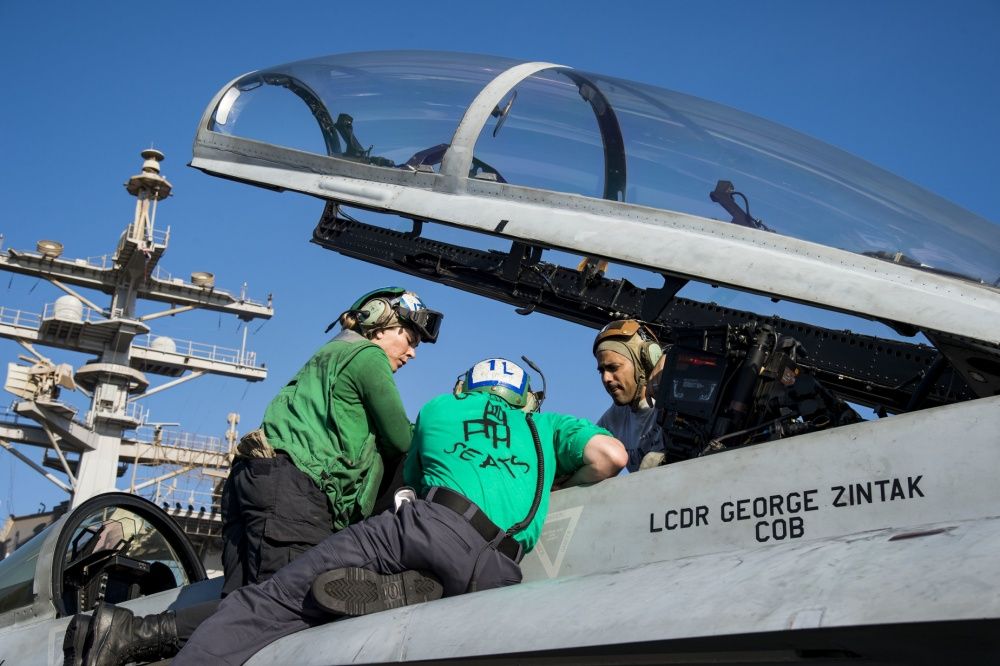 A foreign object debris check is carried out in the cockpit of an F/A-18F Super Hornet, Nov 9th (US Navy)