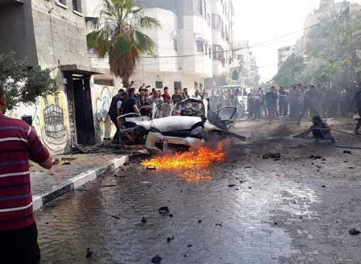 Destruction of a civilian car, resulting in the deaths of Suhaib al-Kahlouf and Muyasara al-Aarer in the northern Gaza City. Image is from a Ola Ghounaim post: https://www.facebook.com/lolo.gho.9/posts/1183391728776423