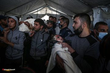 Funeral for members of the Al-Rantisi family killed in strikes on Al Jeniya neighborhood on May 13, 2021. (Image posted by @PalinfoAr)