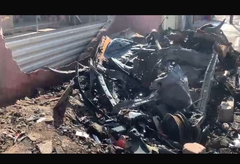 An image of the car that was hit in the US strike. Abdel Rahman Al-Rawi was standing only metres away, his family said. Picture provided by his family.