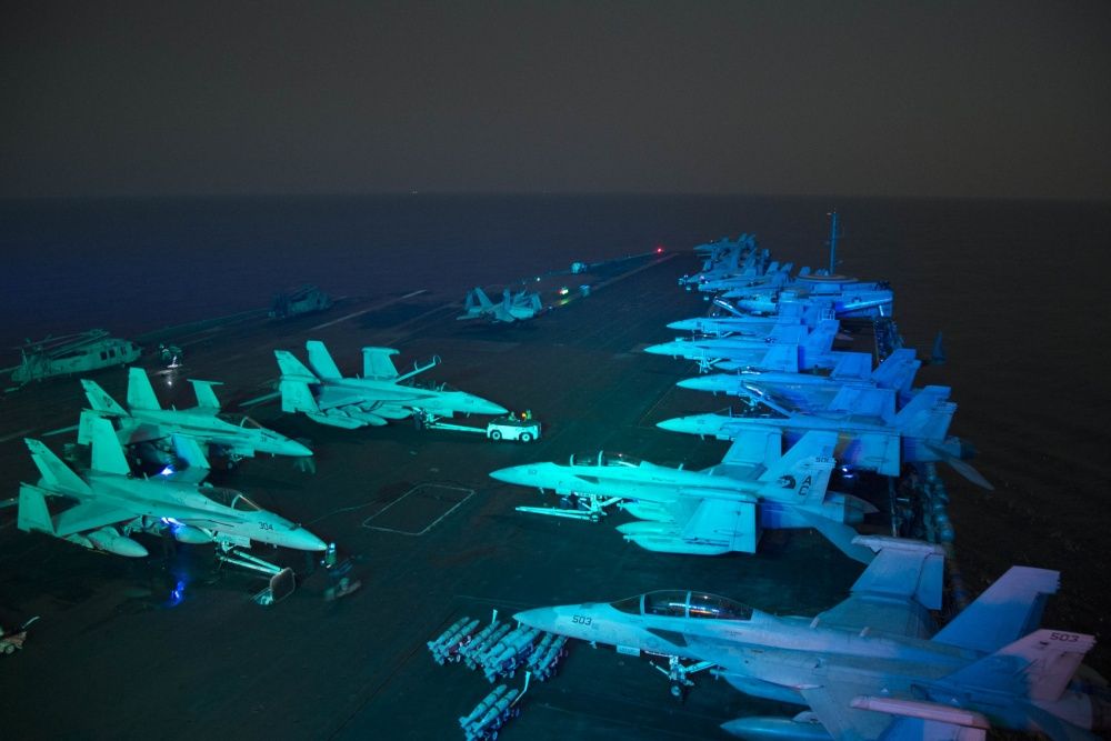 Preparations for flight operations on the deck of deck of USS Dwight D. Eisenhower, Oct 19th (US Navy)