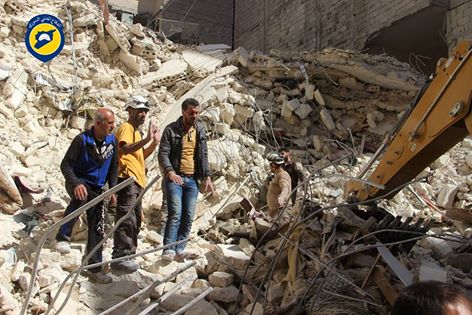The civil defence working to rescue people from under the rubble after the aerial shelling of Al Quds hospital in al-Sukkari, Aleppo (via Aleppo White Helmets)