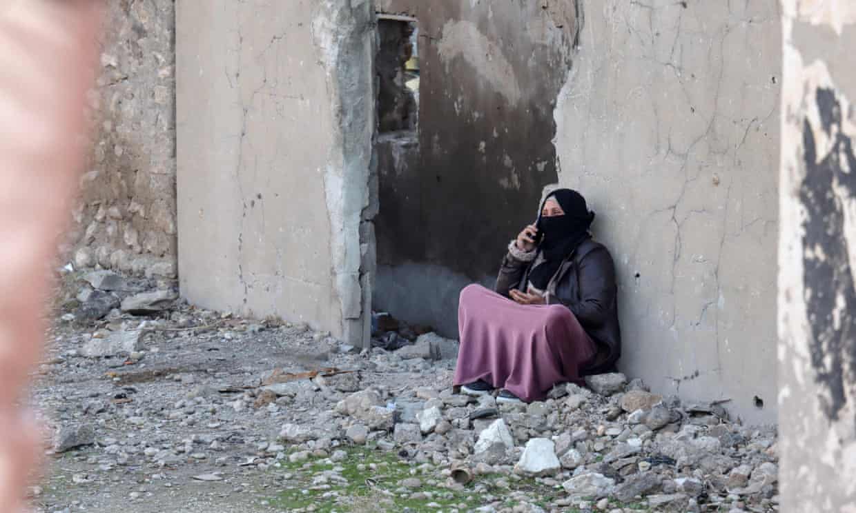 Residents fled their homes in Ghwayran, Hasakah, amid fighting between IS and Kurdish forces in Syria. Photograph: AFP/Getty Images