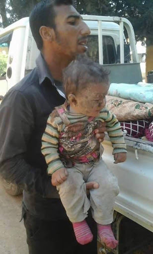 A series of stills from a video published by ISIS-affiliated media showing very graphic imagery of the dead a large proportion of them children. The video itself has been removed from youtube. [Via: SN4HR report published on May 6th 2015]