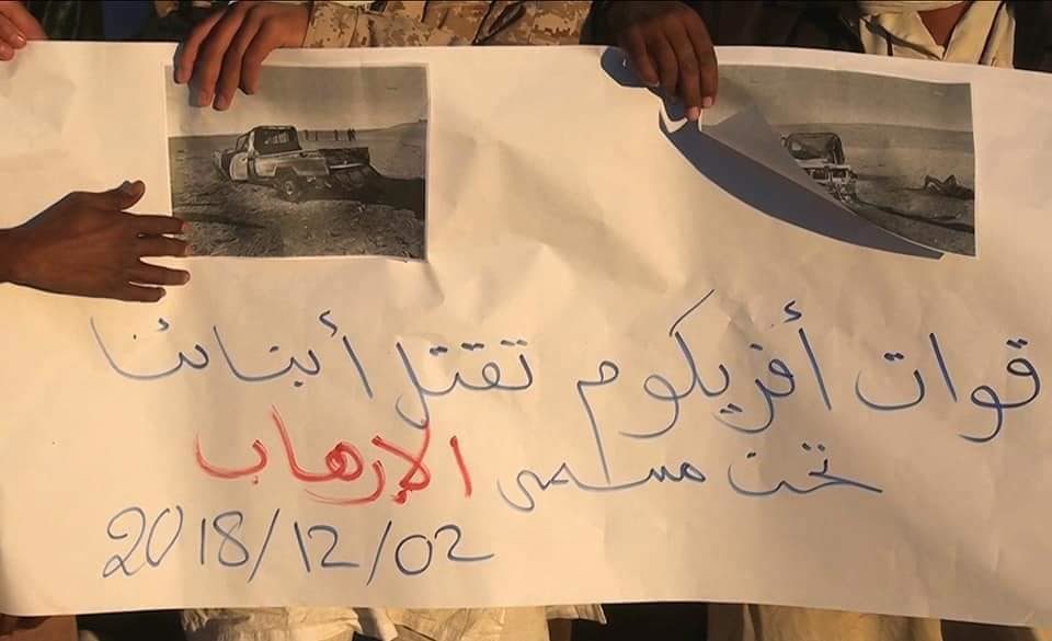 Poster from the demonstration saying: "AFRICOM forces kill our sons under the so-called War on Terror" (via Libya's Channel)