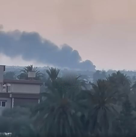 Smoke from alleged GNU airstrikes on Al Maya port on May 28, 2023. (Image posted by @libyapress2010)