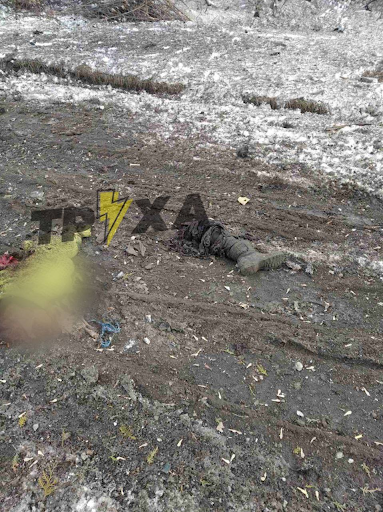 Very graphic image of person killed by alleged Russian shelling of Zolochev on March 10, 2022. (Image posted by Truexanewsua).