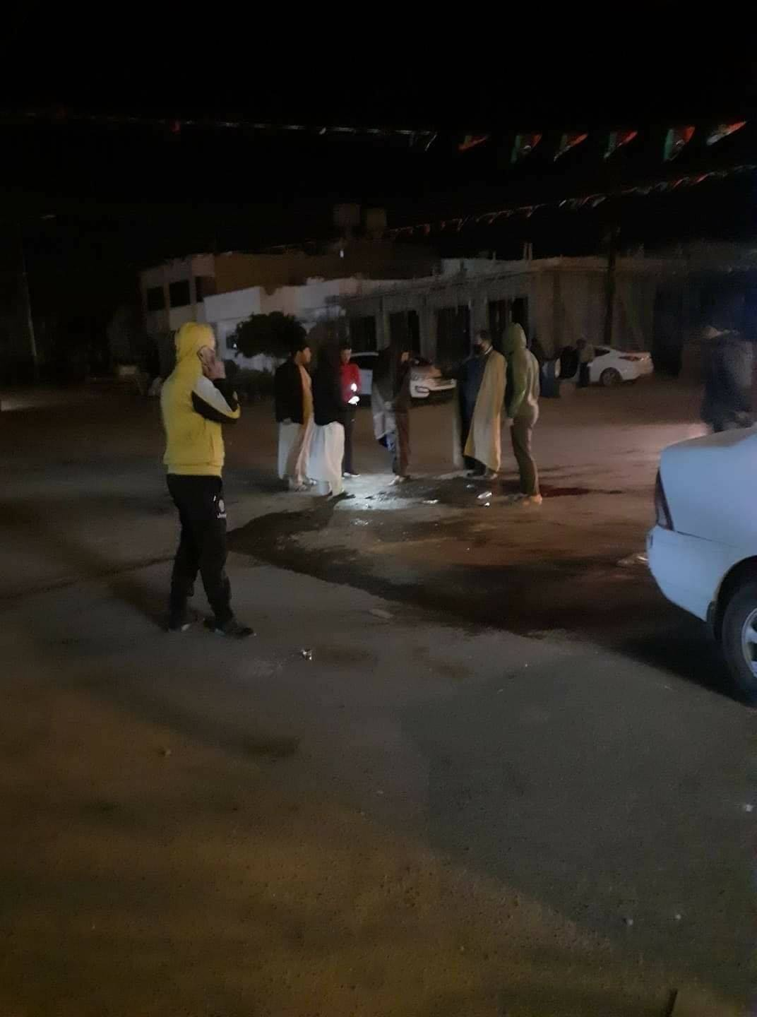 Civilians standing in the location where a mortar had landed earlier in Manshiya in Sabha and led to the death of a child and the injury of up to 30 others including children. (via Sabha News).
