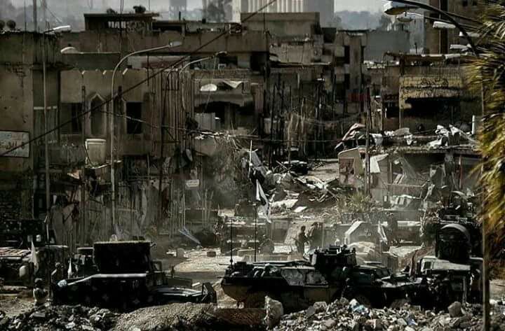 The aftermath of heavy shelling on Nabi Sheet, destroying the city's main market for handicraft and killing up to 16 people (via Mosul Ateka)