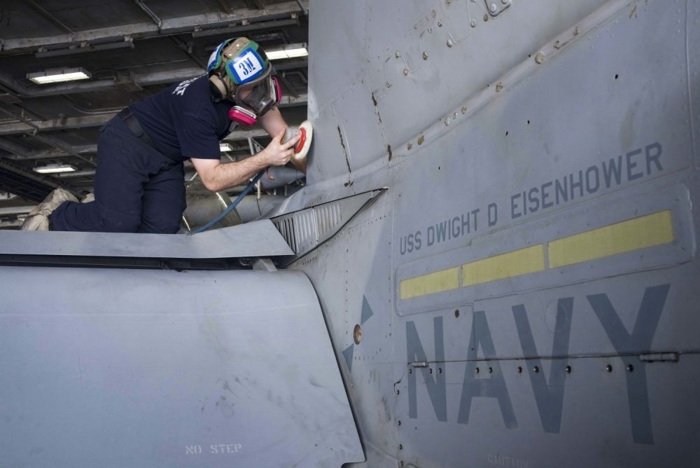 Corrosion is removed from an F/A-18C Hornet, Oct 27th (US Navy)