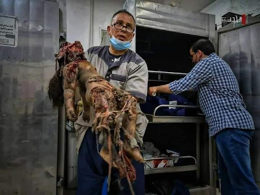 Very graphic images of the children killed in Israeli strikes on Al Shati camp on May 15th, 2021. (Image posted by Sharef Suliman Al Farhta via Facebook)