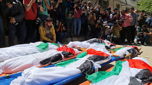 Funeral for the 10 women and children killed in Israeli strikes on Al Shati camp on May 15th, 2021. (Image posted by @RassdNewsN)