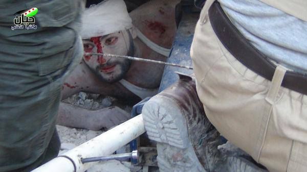 Victim of likely Russian strike at Hayyan, October 13th 2015 is rescued [via Shaam News Network)