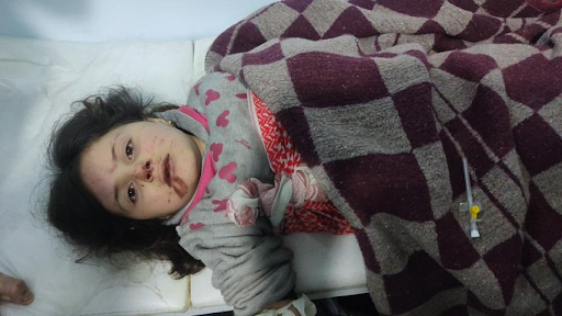 A young girl wounded in the fighting after a US air drop operation targeted a house in Dayr Balut on February 3rd 2022 in the early hours of the morning. Reports indicate that at least eleven civilians were killed (Image via @NotWoofers) / Twitter)