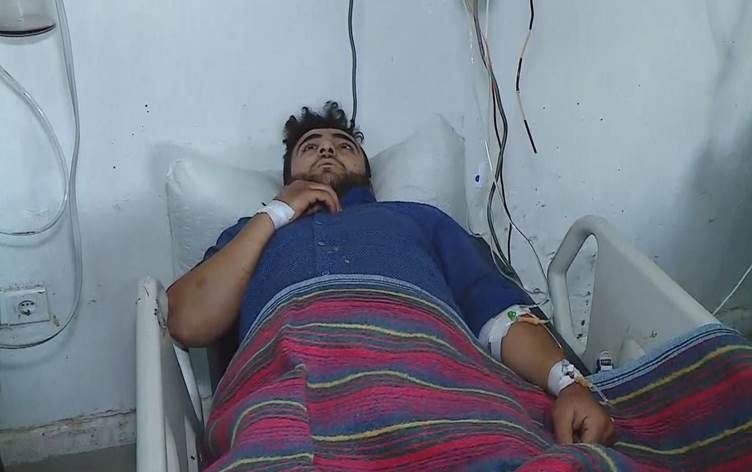 "Hassan Muhsin, injured in Turkish shelling in the Zakho region, lies in a Duhok hospital bed on May 26, 2021." (Uploaded by Rudaw)